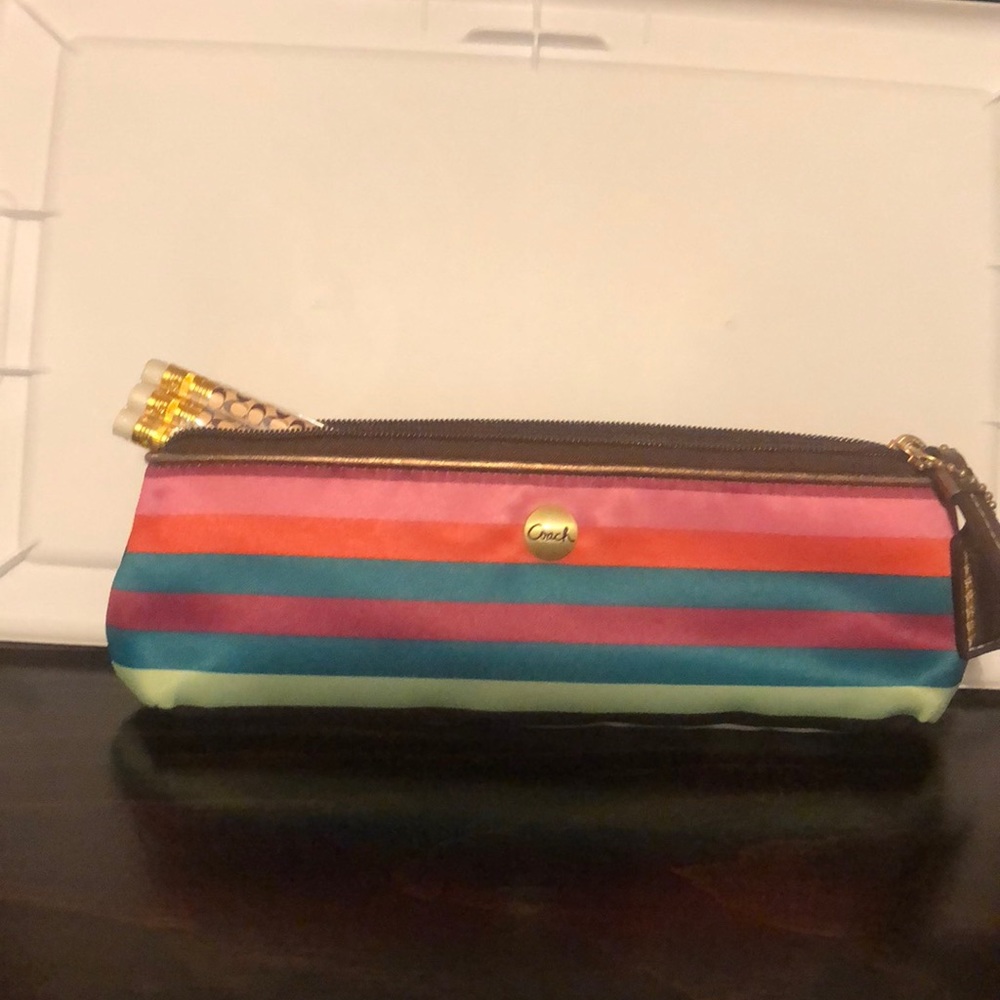 Coach pencil case with three pencils